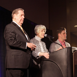 Elder Holland, Pamela Atkinson, and Clay Olsen take questions from the audience.